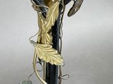 a vase that has some glass on top of it