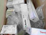 a cardboard box full of medical supplies sitting on a table