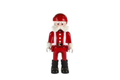 figurine du Père Noël en costume rouge et à la barbe blanche