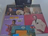 a table with a bunch of records on it