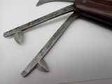 a knife that is laying on top of a knife holder
