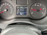 a close up of a car dashboard with a speedometer and gauges