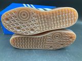 a close up of a pair of shoes on top of a box