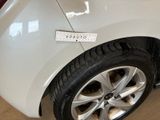 a sticker on the side of a car that says vpauuto