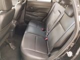 the back seats of a car with a seat belt in a car