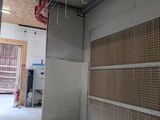 an image of a garage being remodeled and ready for painting