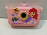 a pink toy camera with a little mermaid on it