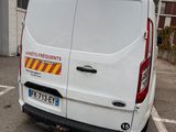 a white van that is parked in a parking lot