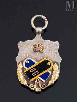 a close up of a medal on a black surface with a black background