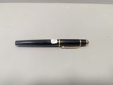 an image of a pen on a white surface