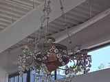 a chandelier hanging from the ceiling of a house