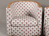 pair of art deco lounge chairs in the manner of person