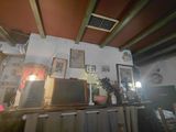 a room with a lot of pictures and pictures on the wall