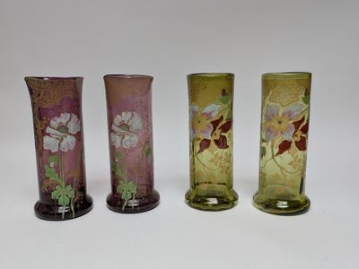 three vases sitting next to each other on a table