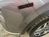 a close up of a car with a sticker on the side of it