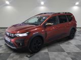 a red suv parked in a room with a checkered floor