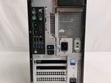 a close up of a computer tower with a keyboard and mouse