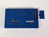 an image of a close up of a blue device on a white surface