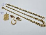 a collection of gold chains and clasps