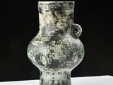 a vase that is sitting on a white table