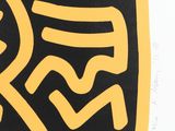 yellow and black painting of a stylized design on a white background
