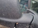 a side view mirror of a car with a broken mirror