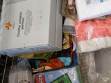 a basket full of items that are sitting on the floor