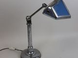an image of a desk lamp on a white surface