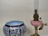 two vases and a lamp on a table