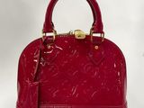 Sac à main Louis Vu Vu en vernis rouge avec finitions dorées