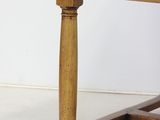 an image of a wooden table on a white floor