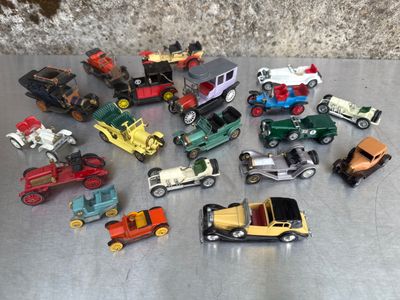 a lot of toy cars that are on a table
