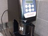 a coffee maker sitting on a counter in a kitchen