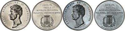 four different types of silver coins are shown in a row