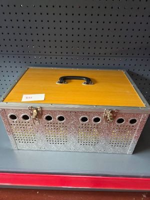 a metal box that is on a shelf in a store