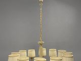 a large chandelier with eight lamps hanging from the ceiling