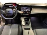 the interior of a car with a steering wheel, dashboard, and dash board