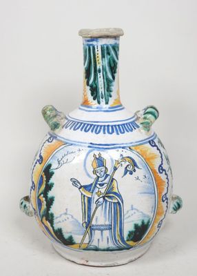 un vase sur lequel figure l'image d'un homme tenant un bâton