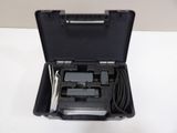 a close up of a black case with wires and wires in it