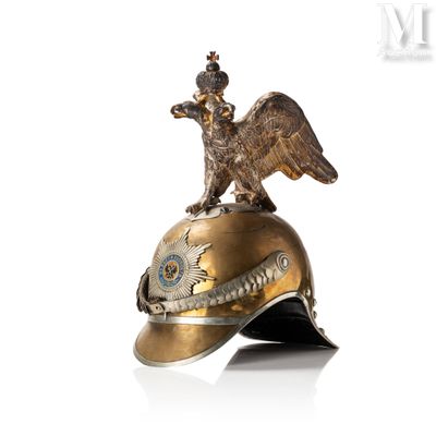 a gold helmet with an eagle on top of it