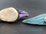 two pairs of blue and purple fabric earrings with a gold disc