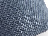the pillow is made of woven fabric and has a dark blue color