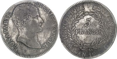 a close up of a coin on a white background