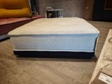 a mattress that is sitting on the floor in a store