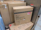 many boxes stacked on top of each other on the floor