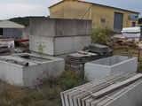 a pile of concrete blocks sitting in the middle of a yard