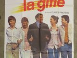 the poster for the movie lagiffe is hanging on the wall