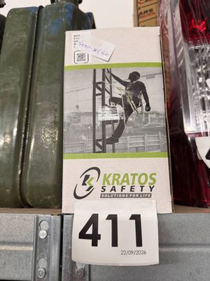 several suitcases are on a shelf in a store with a price tag