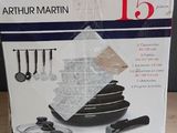 packaging of a boxed set of kitchen utensils on a wooden table