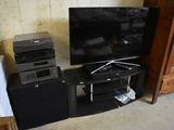 a lot of electronics that are sitting on the floor